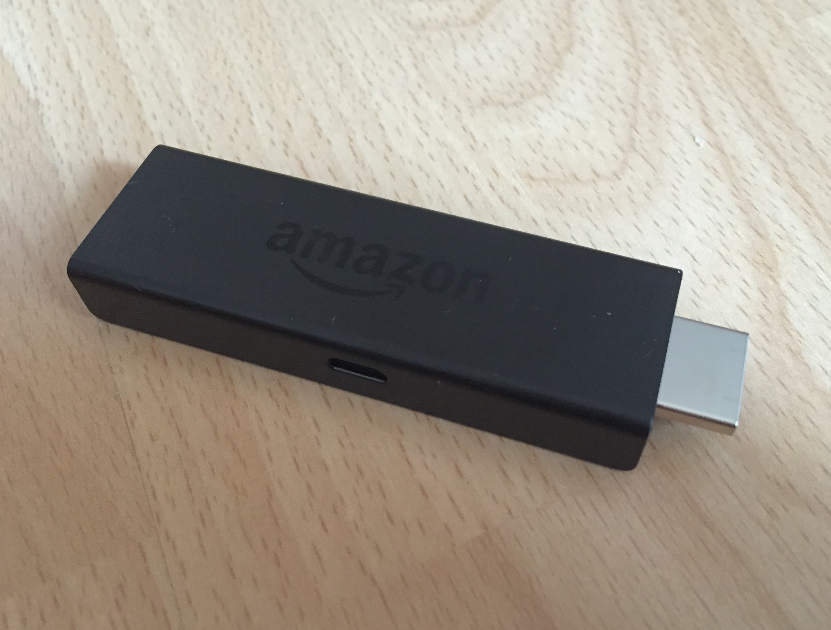 An original Amazon Fire TV Stick photographed in 2015